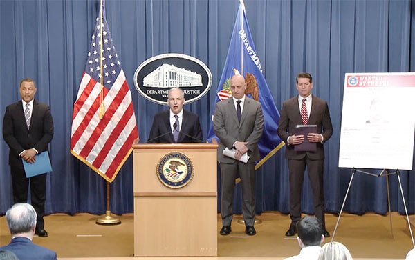 美國司法部2022年3月16日宣布對五名涉嫌替中共國安辦事的人提出起訴。（美國司法部視頻截圖）