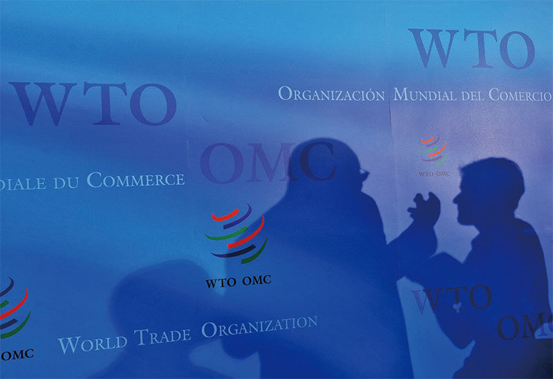 美國政府表示支持中共加入世貿組織是個錯誤的決定，現在WTO的規則不足以遏止中共扭曲市場的行為，美國將加強貿易執法。（AFP）
