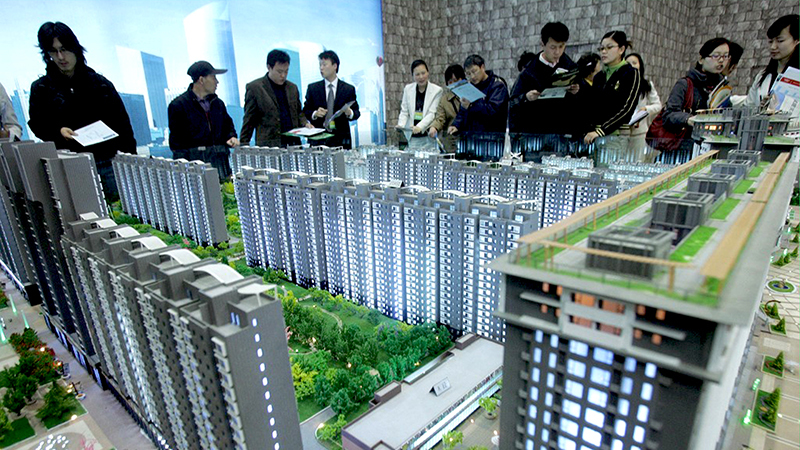  中國房企業績近腰斬 多地取消限購限售