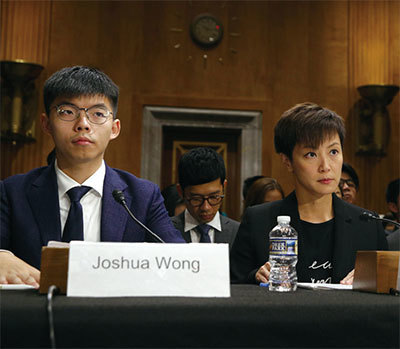 9月17日，黃之鋒、何韻詩在美國國會發言，促通過香港人權民主法案。（Getty Images）