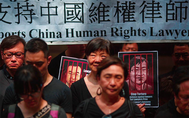 香港多個團體7月9日舉辦首屆「中國人權律師節」活動，並呼籲外界繼續關注仍在押的709案王全璋、江天勇等人。（AFP）