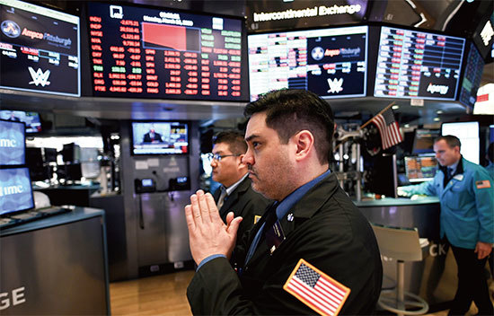 3月16日紐約證券交易所再次大幅下跌，一周內第三度啟動熔斷機制。（Getty Images）