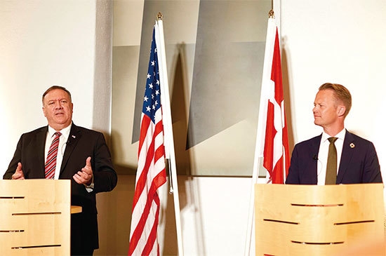 7月22日，美國務卿蓬佩奧（左）在丹麥舉行的一次聯合記者會上表示，正在就中共如何表現制定出明確預期要求。圖右為丹麥外相科弗德。（Getty Images）