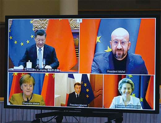 2020年12月30日歐盟和中國達成商業投資協議。圖為習近平與歐盟領導人舉行視訊會談。（Johanna Geron / AFP）