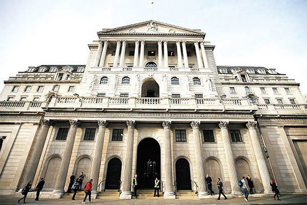 倫敦城中心有一座堡壘似的八層大廈，就是被稱為「銀行之王」的英國中央銀行——英格蘭銀行（圖），其周邊圍繞著100多家本國銀行和520多家外國銀行。（Daniel Leal-Olivas/AFP）