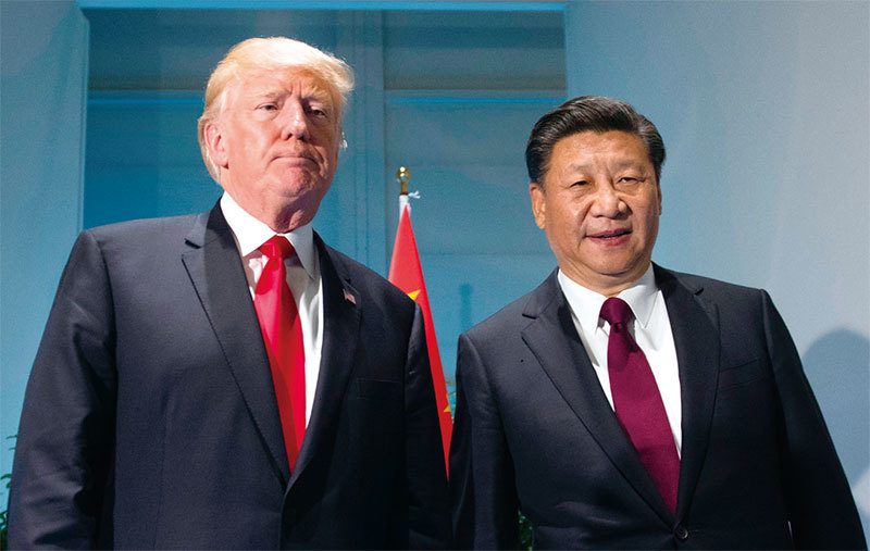 白宮9月18日在一份聲明中表示，美國總統川普和中國國家主席習近平再次通話，承諾更大限度地施壓北韓。圖為7月8日德國G20會議期間川普和習近平談論了「共同對付朝鮮」的方法。（AFP）