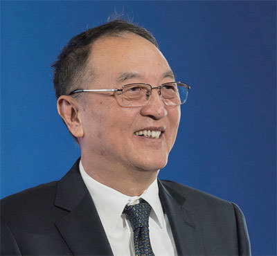 2015年柳傳志於中國企業家俱樂部10周年活動上發言。（Jacques Witt / AFP）