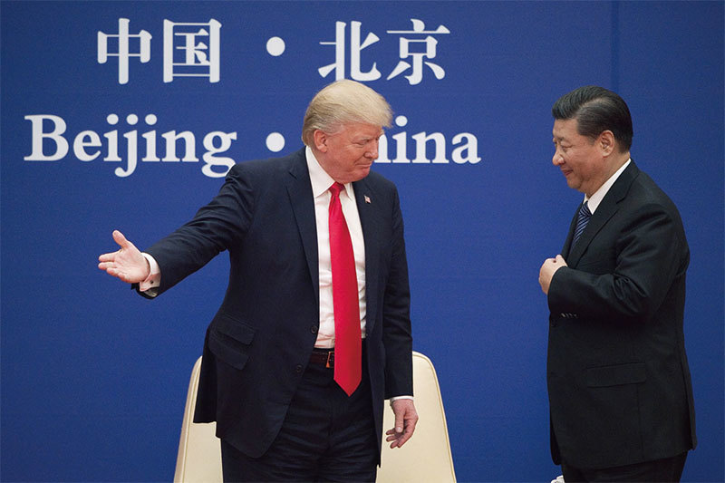 美國總統川普（左）與中國國家主席習近平（右）。（AFP）
