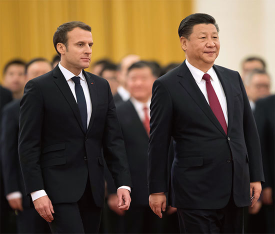 法國總統馬克龍訪華，習近平的「大內總管」丁薛祥罕見缺席，引發外界猜測。圖為1月9日習近平在北京人民大會堂舉行歡迎馬克龍儀式。（Getty Images）