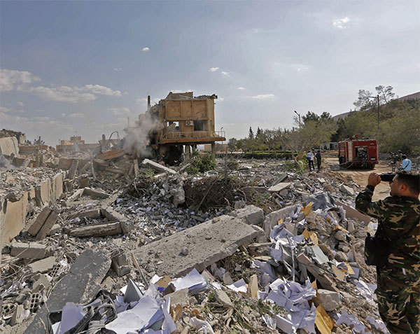 美軍聯合參謀部主任表示國防部在這次攻擊敘利亞的行動完全沒有受到干擾；在大馬士革的科學研究中心Barzah的三棟大樓現已成廢墟。（AFP）