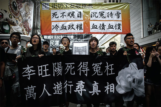 薄熙來案爆發後，江派在湖南不斷製造事端，進行攪局。如2012年「六四」鐵漢李旺陽在湖南離奇「被自殺」。引發海內外抗議活動。（AFP）
