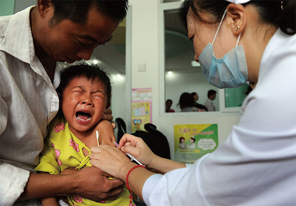 默克公司將疫苗作為禮物送給中國，對中國人民來說是一件無價之寶。（AFP）