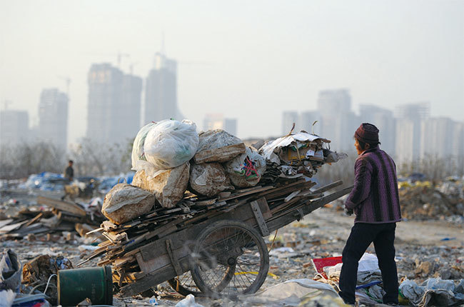 最新中國貧富差距報告顯示，中國貧富懸殊已超過「破壞拐點」。（AFP）