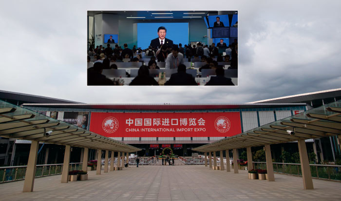 上圖：首屆中國國際進口博覽會開幕式。（AFP） 下圖：儘管中共竭力裝扮成全球化的支持者，但並沒有成功說服世界，沒人相信它真的要開放經濟。（Getty Images）