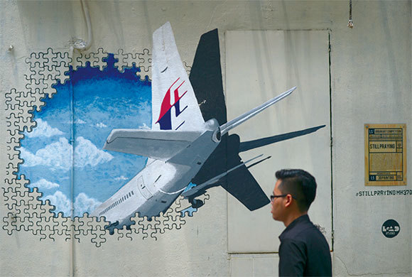 2014年4月15日，據中共海軍新聞發言人梁陽表示，因馬航MH370客機失聯原因不明、搜尋未果，在此特殊情況下，海軍成立日不舉行多國海上閱兵活動。（AFP）